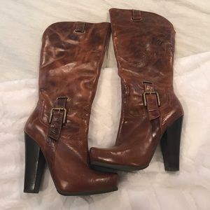 Brown leather high heeled boots